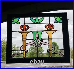 ANTIQUE STAINED GLASS WINDOW, 2 TORCHES, NYC area salvage, 1920s ANTIQUE STAINED GLASS WINDOW, 2 TORCHES, NYC area salvage, 1920s