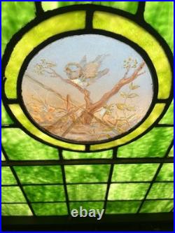 ANTIQUE STAINED GLASS WINDOW, a bird on a branch, EARLY 1900s LEHIGHTON PA ANTIQUE STAINED GLASS WINDOW, a bird on a branch, EARLY 1900s LEHIGHTON PA