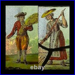 A PAIR OF CHARMING 17th C. FLEMISH STAINED GLASS WINDOW PANELS COUPLE HARVESTING