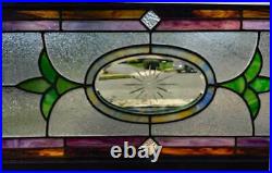 Antique STAINED GLASS TRANSOM WINDOW With BEVELED GLASS CUT STAR