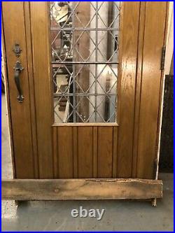 Arched Oak Leaded Glass Door with Encasement Frame and Hardware Mansion Salvage