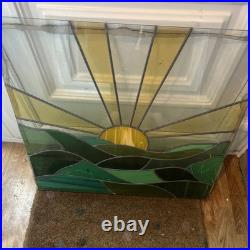 Beautiful Stained Glass Window Sunrise Green Feild Background with lead fixture Beautiful Stained Glass Window Sunrise Green Feild Background with lead fixture
