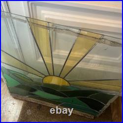 Beautiful Stained Glass Window Sunrise Green Feild Background with lead fixture Beautiful Stained Glass Window Sunrise Green Feild Background with lead fixture