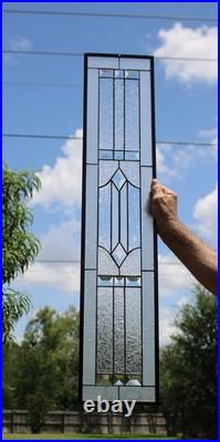 Clear, beveled stained glass window hanging sidelight, transom, obscure texture