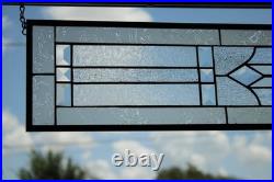 Clear, beveled stained glass window hanging sidelight, transom, obscure texture