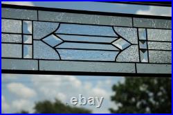 Clear, beveled stained glass window hanging sidelight, transom, obscure texture