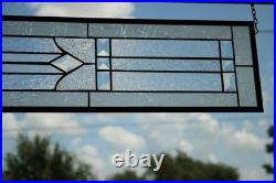 Clear, beveled stained glass window hanging sidelight, transom, obscure texture