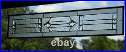Clear, beveled stained glass window hanging sidelight, transom, obscure texture