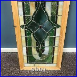 Framed Stained Glass Window With Beveled Center Flower Glass