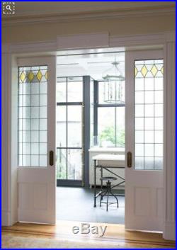 Pocket Doors with Heritage Leaded Glass panels Wow