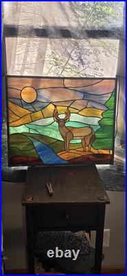 Stained glass panel featuring a buck in a landscape setting, Tiffany Style