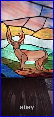 Stained glass panel featuring a buck in a landscape setting, Tiffany Style