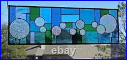 Stained glass transom/sidelight featuring modern geometric art glass