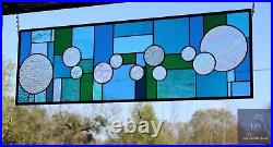 Stained glass transom/sidelight featuring modern geometric art glass