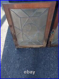 Vintage stained glass window pair